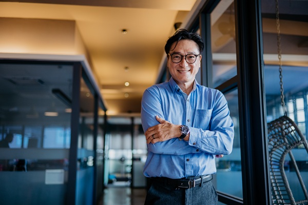 confidence mature businessman in office