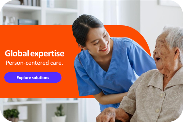 Nurse caring for elderly patient with compassion.