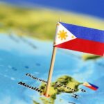 Filipijnse vlag op een wereldkaart van de Filipijnen