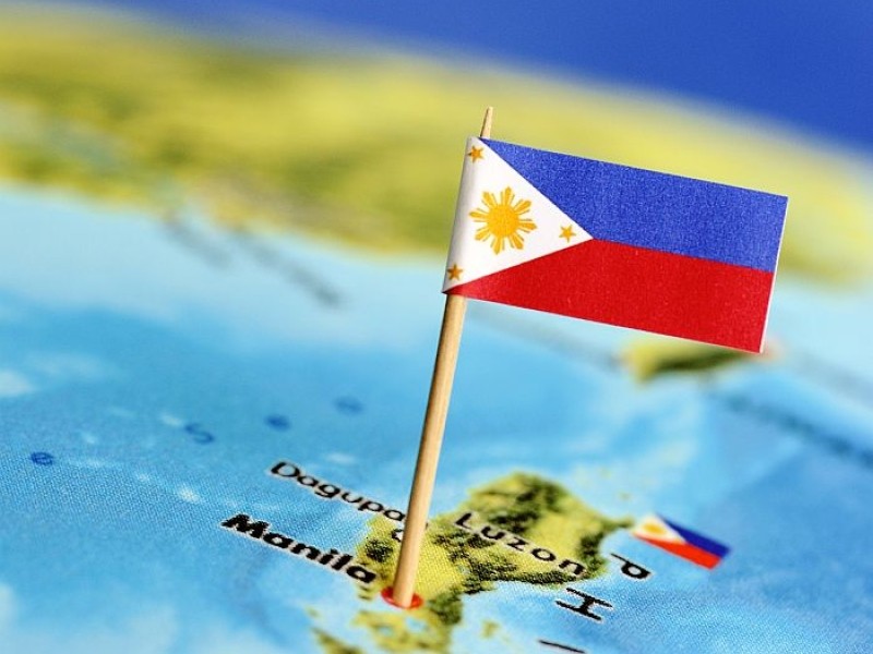 Filipijnse vlag op een wereldkaart van de Filipijnen