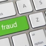 Toetsenbord met groene toets 'fraude'.