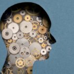 Silhouet met tandwielen als brein