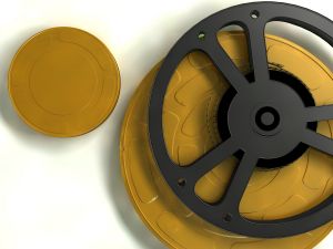 Filmspoelen met geel deksel, overhead view.