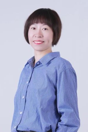 Smiling woman in a blue striped button-up shirt