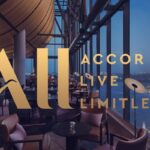 Accor Live Limitless logo with city view.