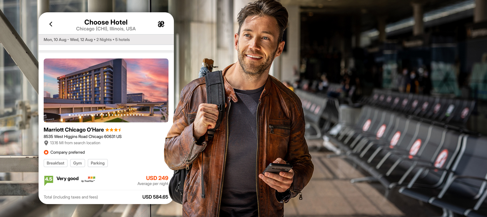 Traveler at airport browsing hotel booking app