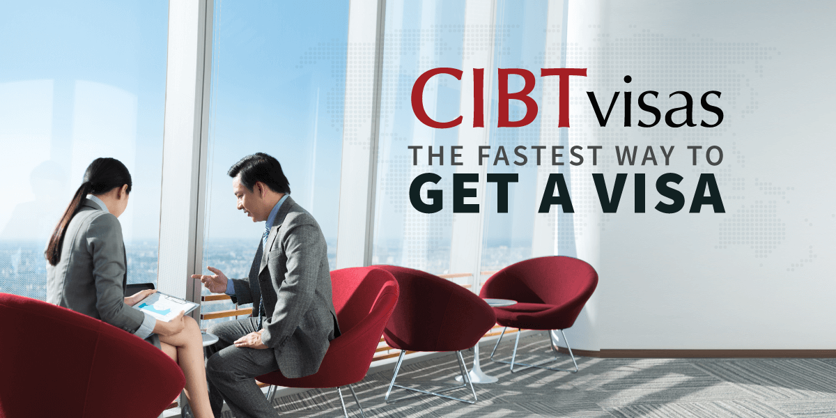 Business professionals discussing visa services in modern office