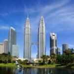 Petronas Towers in Kuala Lumpur skyline view.