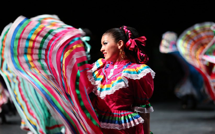 From the Dallas-founded Anita N. Martinez company, a dancer in traditional dress performs Ballet Folklorico. Photo courtesy of VisitDallas.com.