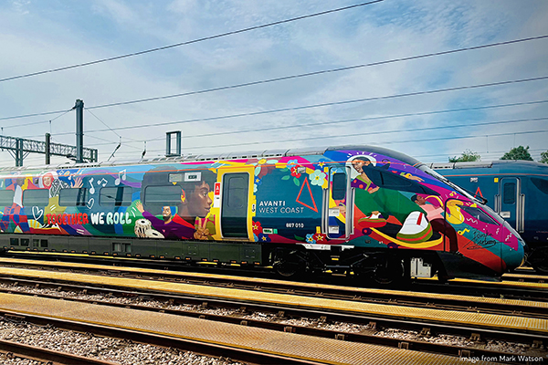 Colorfully painted Avanti West Coast train at railway station