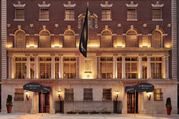 Illuminated Hotel Wolsely facade at dusk