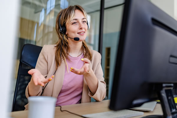 Travel agent at desk