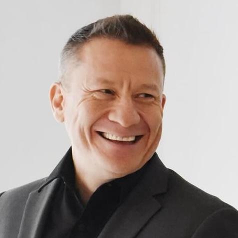 Smiling man in dark blazer portrait