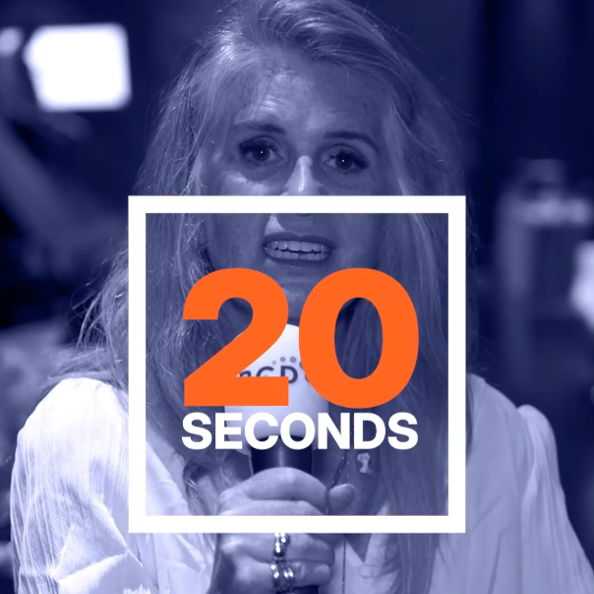 Woman talking with overlay '20 seconds'.