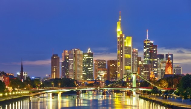Frankfurt city skyline at night with river