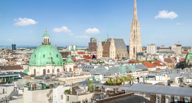 Vienna skyline with historic buildings and cathedral.