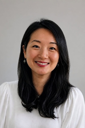 Smiling woman with long dark hair portrait