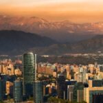 Santiago skyline with mountains at sunset.