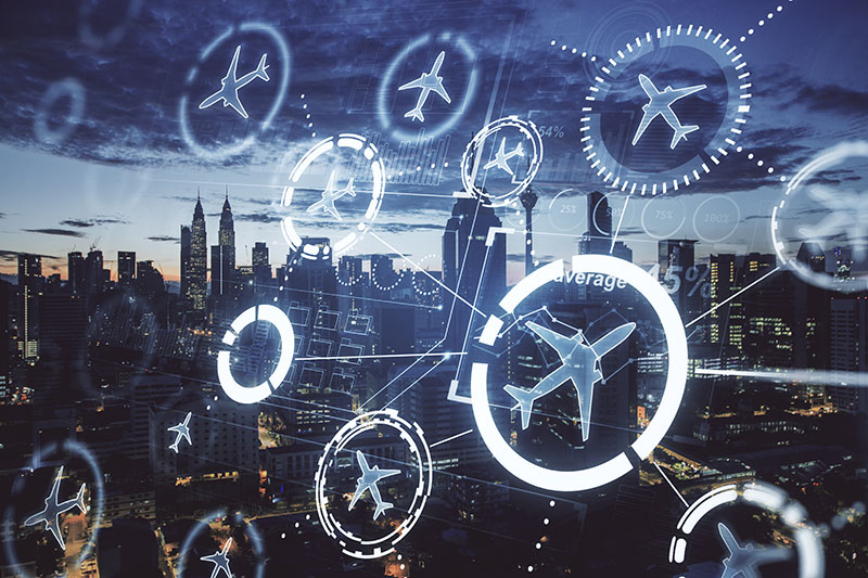 City skyline with digital airplane network overlay at dusk